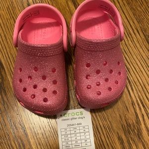 NWT pink sparkle crocs - toddler size 6